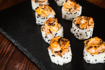 dishes of Japanese cuisine rolls with fish