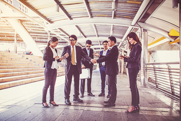 businesspeople group handshake at city, business team