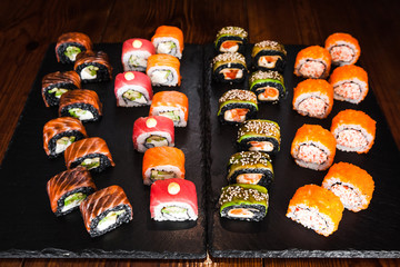 dishes of Japanese cuisine rolls with fish