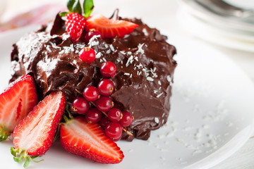Raw chocolate and beetroot cake with berries