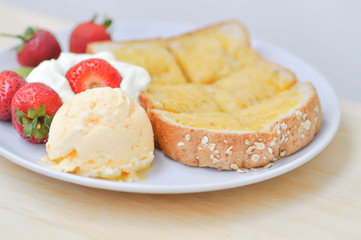 toast or bread with butter topping and ice cream