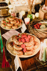 Elegant candy bar for a wedding full of pastries