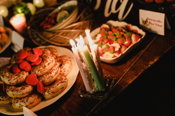 Elegant candy bar for a wedding full of pastries