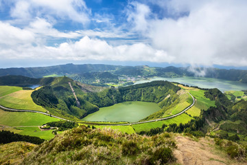 Obraz premium Aerial view of Lagoa de Santiago located in Sete Cidades volcano complex, Sao Miguel island, Azores, Portugal