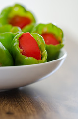Stuffed peppers in pot ready for cooking