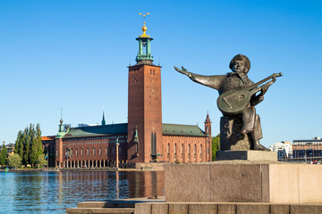 Stockholm City Hall and Evert Taube statue