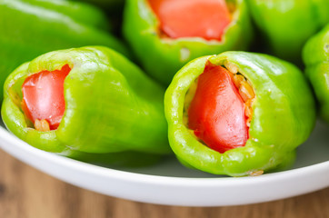 Stuffed peppers in pot ready for cooking