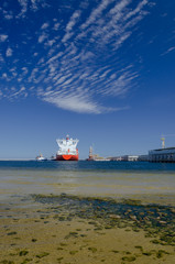 LNG TANKER - A red ship at the gas terminal © Wojciech Wrzesień