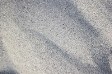 Fototapeta na wymiar Sand pattern texture. Sea sand background for design your work.