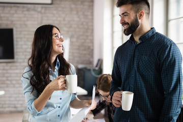 Portrait of architects having discussion in office