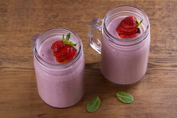 Milkshake with strawberries and banana. Strawberry smoothie