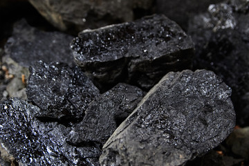 Close up of black coal pile. Coal mining