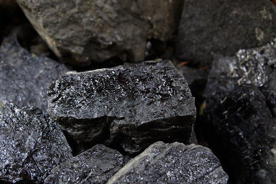 Close up of black coal pile. Coal mining