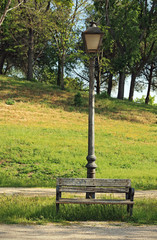 Bench and lamppost in the park