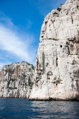 Fototapeta na wymiar White rocks and blue sea. The famous Calanques national park of Cassis (near Marseilles in Provence, France).