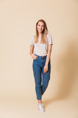 Full length portrait of a cheerful casual girl