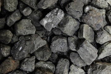 Black coal background or texture. Top view. Coal mining concept.