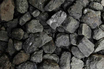 Black coal background or texture. Top view. Coal mining concept.