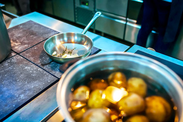 Cooking process in the pan at kitchen
