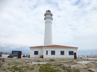 Fototapeta premium Faro de Torrox, localidad de España, en la provincia de Málaga, comunidad autónoma de Andalucía, en la Costa del Sol Oriental, a orillas del mar Mediterráneo