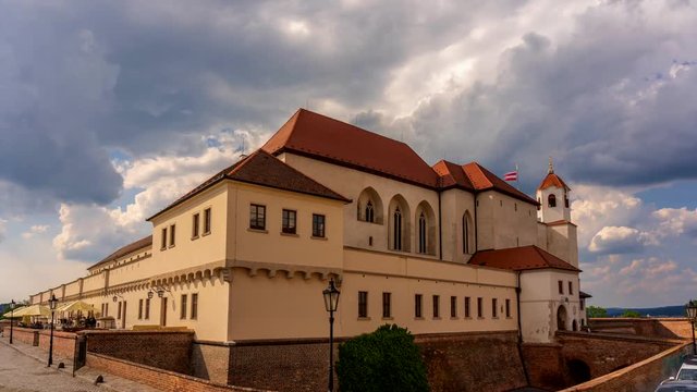 Time-lapse footage of old castle Spilberk in Brno, Czech Republic. Old buildings and city landmarks with dramatic clouds passing over.
