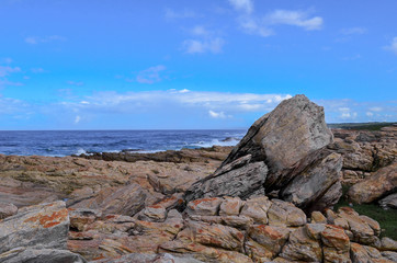 Fototapeta na wymiar Indian ocean and big rocks Cape St Francis
