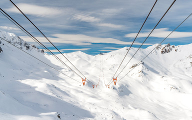 ski lift in arosa switzerland blue sky