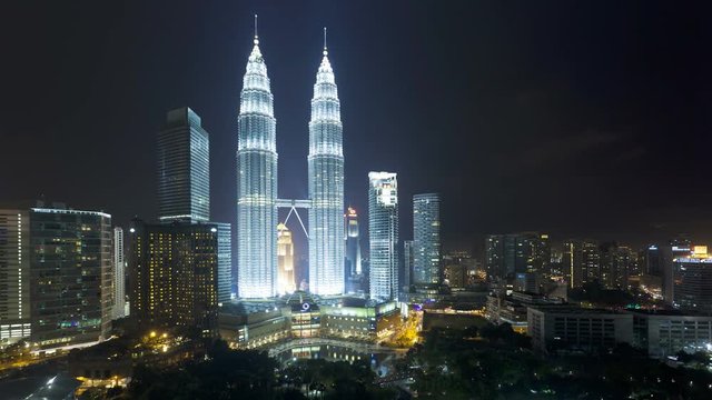 Illuminated night view of the Petronas Twin Towers, Kuala Lumpur City Centre KLCC, Malaysia, Kuala Lumpur, Asia, Time lapse