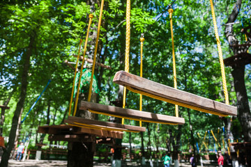 Fototapeta na wymiar Rope Park Rope Bridges Ropes Insurance Ladders