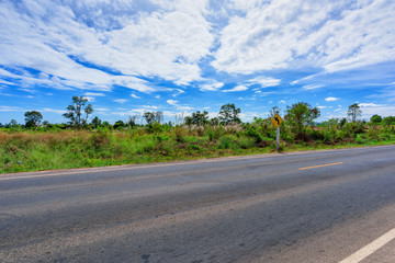 Fototapeta premium Asphalt road side view and landscape countryside.
