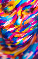 Fototapeta na wymiar Portrait of the bright beautiful girl with painting art colorful make-up on face and bodyart. Creative vertical ads banner or flyer with copy space.