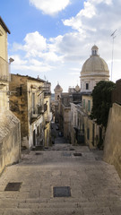 View of the dome of the Baroque church Cathedral of San Nicola di Mira in the center of Noto in the province of Syracuse in Sicily, Italy