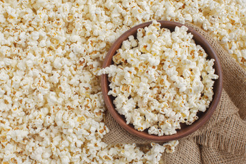 Tasty salted popcorn in bowl