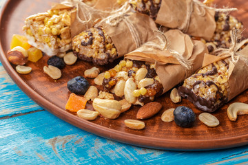 Granola bar on wooden background