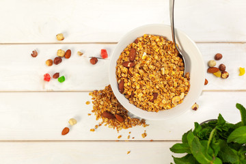 Food background of fresh baked homemade granola in bowl