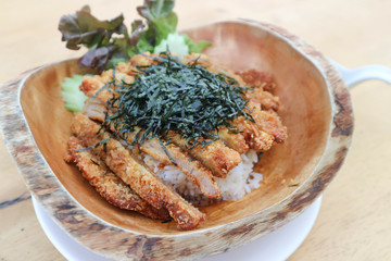 rice topped with fried pork or Tonkatsu