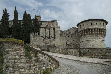 Fototapeta na wymiar Gates and walls of medieval fortress in Brescia city, Italy