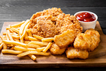 fried chicken with french fries and nuggets meal