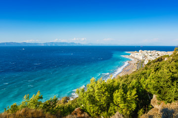 Fototapeta na wymiar View of Aegean coast of City of Rhodes, Turkish coast in background (Rhodes, Greece)
