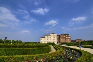 Venaria Reale, Piedmont region, Italy. June 2017. The landscape of the gardens of the royal palace of Venaria. View from the gardens towards the palace. 