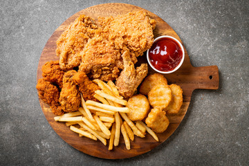 fried chicken with french fries and nuggets meal
