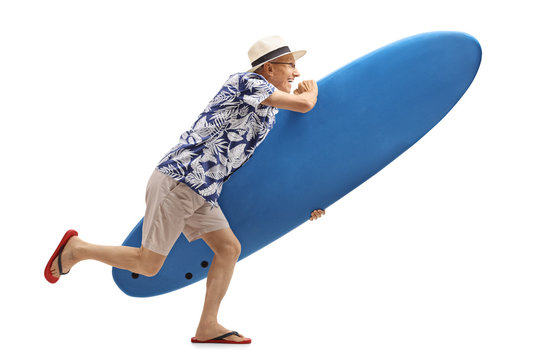Elderly tourist with a surfboard running