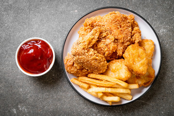 fried chicken with french fries and nuggets meal