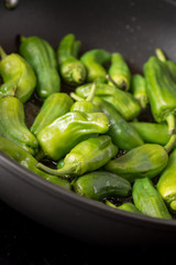 Green Peppers Padron Preparation in the Frying Pan
