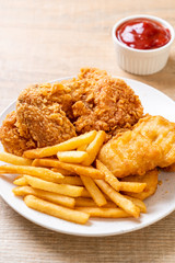 fried chicken with french fries and nuggets meal