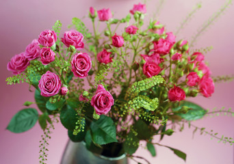 Bouquet of flowers with roses and other plants close up