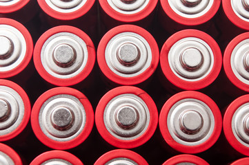 closeup of red and silver aa alkaline batteries group