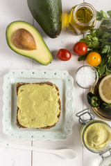 Healthy Breakfast with Fresh Avocado Spread Guacamole on Slice of Bread