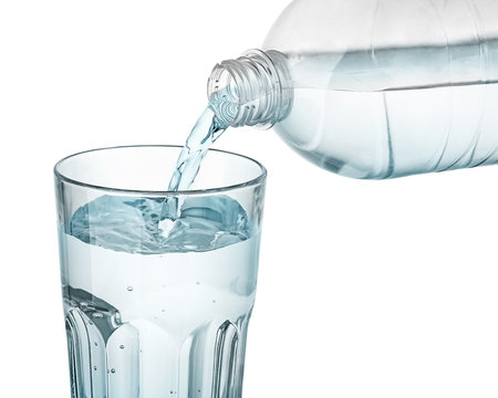 Water is poured into a glass