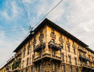 Fototapeta na wymiar Colourful and bright art-noveau Liberty style buildings in the Porta Venezia distrct of Milan, Lombardy, Italy